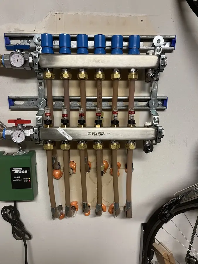 Plumber performing Water Heater Repair at a residential property in Annapolis Neck